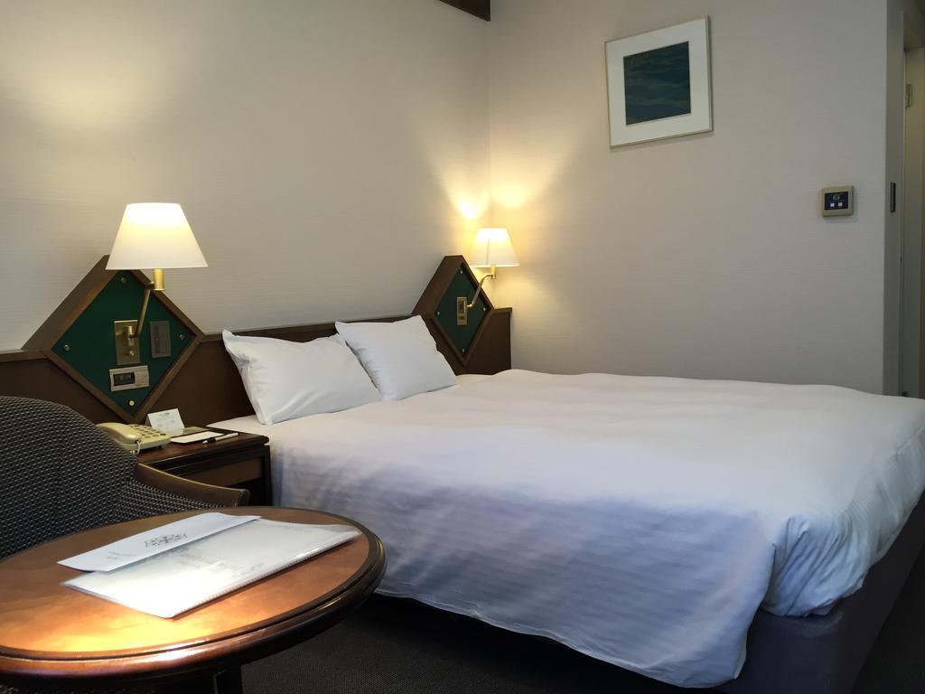 Hotel New Omi Omihachiman Habitación foto